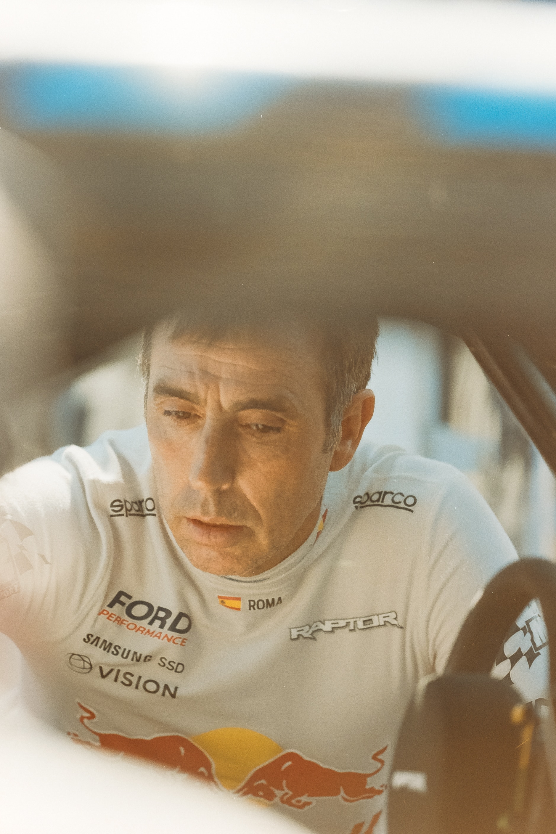 This image concentrates on who I always feel is the most important person on race day – the driver. The shot of Nani Roma was taken just after he had finished a run on the rally circuit in the Raptor T1+. I like that this seems to capture him in a more pensive moment that maybe is not so often seen. The sunlight is reflecting off the roof of the car and into the lens, making him appear quite ethereal. License valid for earned editorial, press releases, press kits. All non-broadcast digital and online media Region: Global. This content is solely for editorial use and for providing individual users with information. Any storage in databases, or any distribution to third parties within the scope of commercial use, or for commercial use is permitted with written consent from Ford in Europe GmbH only.